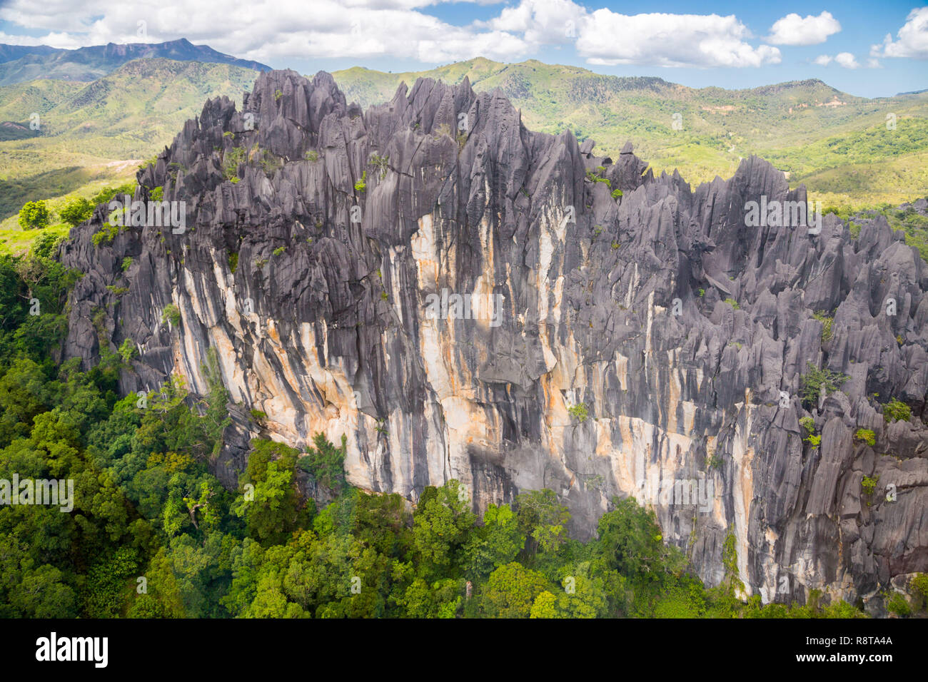 Sharp needles of black volcanic peaks. Mountains near Mont Aoupinie and Poya river, aerial view. North Province, New Caledonia, Micronesia, Oceania. Stock Photo