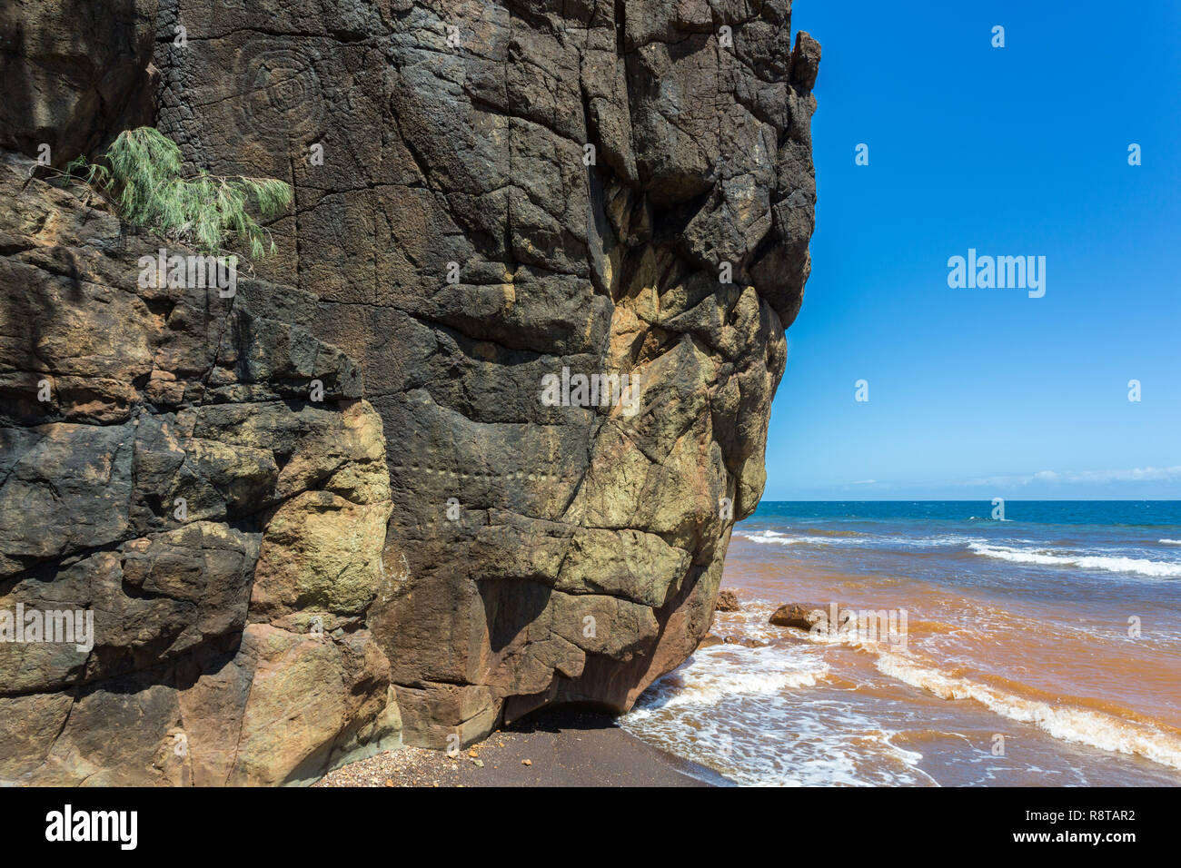 Kanak petroglyphs on a shore near Canala and Nakety, North Province of New Caledonia, Melanesia, Oceania. Aboriginal art. Indigenous people carvings. Stock Photo