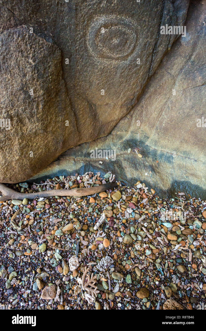 Kanak petroglyphs on a shore near Canala and Nakety, North Province of New Caledonia, Melanesia, Oceania. Aboriginal art. Indigenous people carvings. Stock Photo