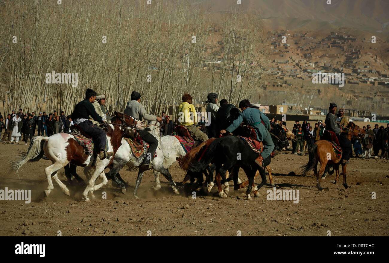 Bamyan, Afghanistan. 16th Dec, 2018. Afghan horsemen compete for the goat  carcass as they attend Buzkashi in Bamyan province, Afghanistan, Dec. 16,  2018. Buzkashi, meaning 