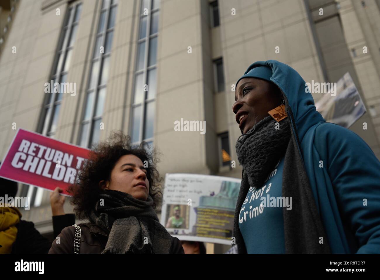 New York, U.S., 17 December 2017  Statue of Liberty climber Patricia Okoumou speaks with supporters outside federal court before her trial by a federal judge on misdemeanor charges of trespassing, disorderly conduct, and interfering with the functioning of government for her act of civil disobedience on July 4. Okoumou climbed the base of the statue to protest against Trump administration immigration policies. Credit: Joseph Reid/Alamy Live News Stock Photo