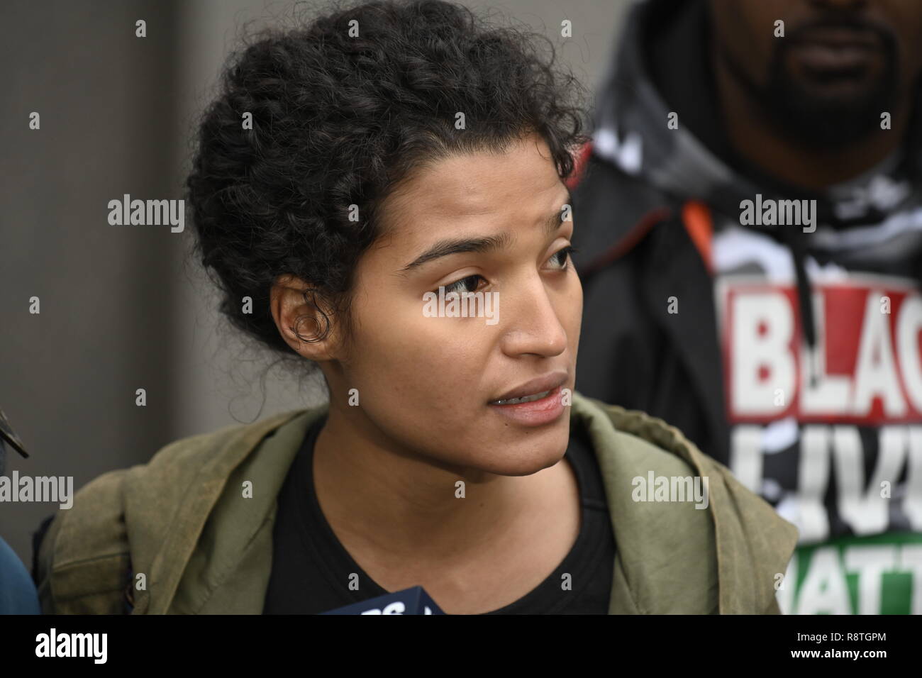 New York, USA. 17th Dec, 2018. New York, U.S., 17 December 2018 Actress and model Indya Moore speaks in support of Statue of Liberty climber Patricia outside federal court following Okoumou's conviction by a federal magistrate judge on misdemeanor charges of trespassing, disorderly conduct, and interfering with the functioning of government for her act of civil disobedience on July 4. Okoumou climbed the base of the statue to protest against Trump administration immigration policies. She is to be sentenced on March 5, 2019. Credit: Joseph Reid/Alamy Live News Stock Photo