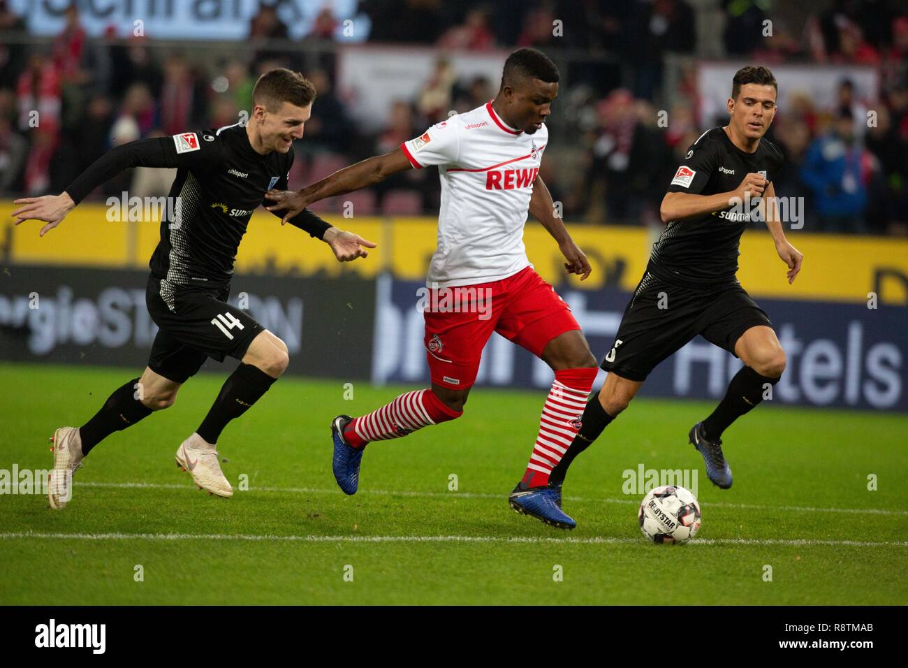 Cologne, Germany 17th December 2018, 2nd League, 1. FC Koeln vs 1. FC Magdeburg: Steffen Schaefer (Magdeburg), Jhon Cordoba (Koeln) in competition.   DFL REGULATIONS PROHIBIT ANY USE OF PHOTOGRAPHS AS IMAGE SEQUENCES AND/OR QUASI-VIDEO             Credit: Juergen Schwarz/Alamy Live News Stock Photo