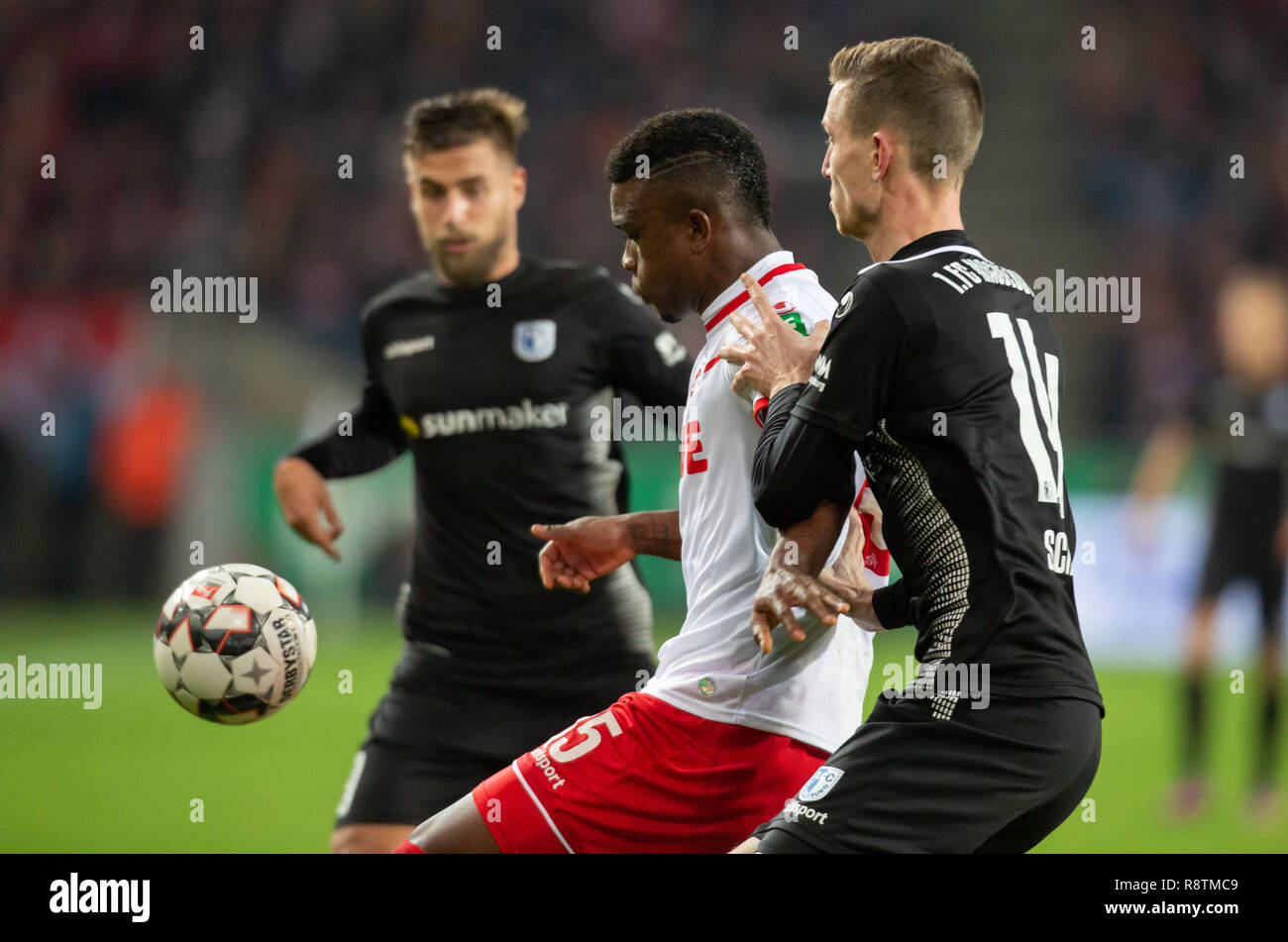 Cologne, Germany 17th December 2018, 2nd League, 1. FC Koeln vs 1. FC Magdeburg: Jhon Cordoba (Koeln), Steffen Schaefer (Magdeburg) in competition.   DFL REGULATIONS PROHIBIT ANY USE OF PHOTOGRAPHS AS IMAGE SEQUENCES AND/OR QUASI-VIDEO             Credit: Juergen Schwarz/Alamy Live News Stock Photo
