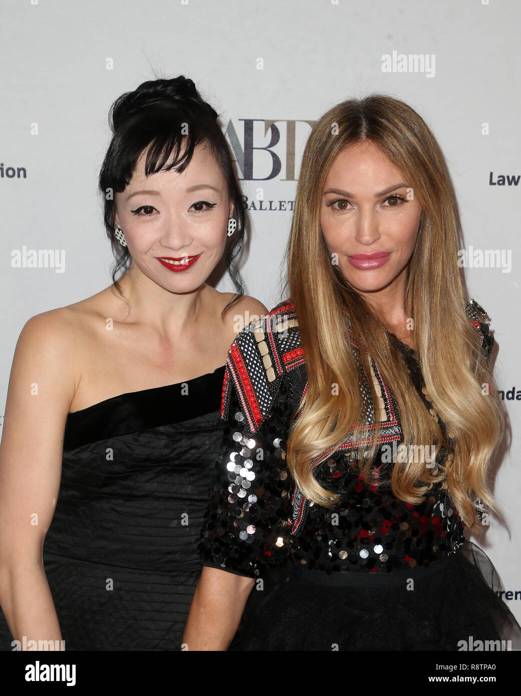 BEVERLY HILLS, CA - DECEMBER 17: ZJ Fang and Jolene Blalock Rapino at the American Ballet Theatre’s Annual Holiday Benefit at The Beverly Hilton Hotel in Beverly Hills, California on December 17, 2018. Credit: Faye Sadou/MediaPunch Stock Photo