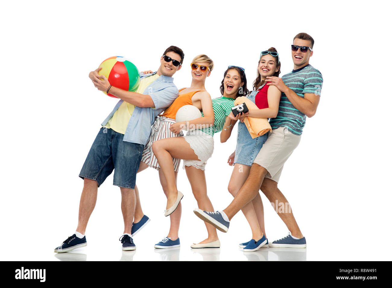happy friends with beach and summer accessories Stock Photo