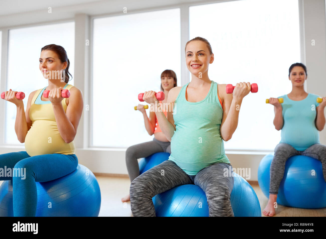 pregnant women training with exercise balls in gym Stock Photo Alamy