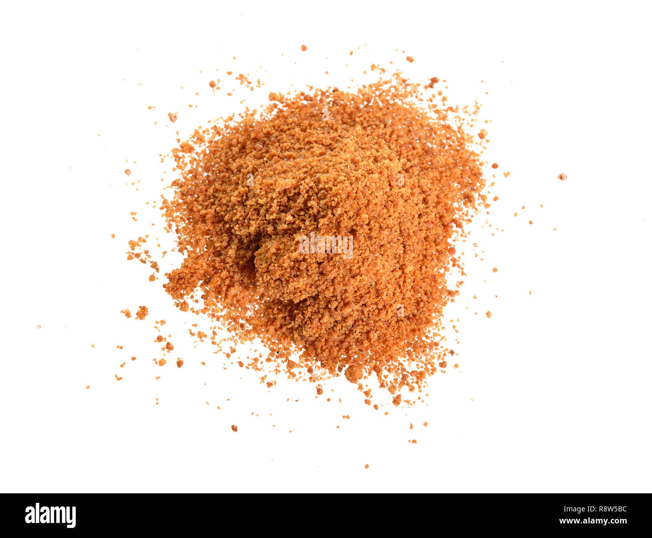 Coconut sugar, also known as coco sugar, coconut palm sugar, coco sap sugar or coconut blossom. Isolated on white background. Stock Photo