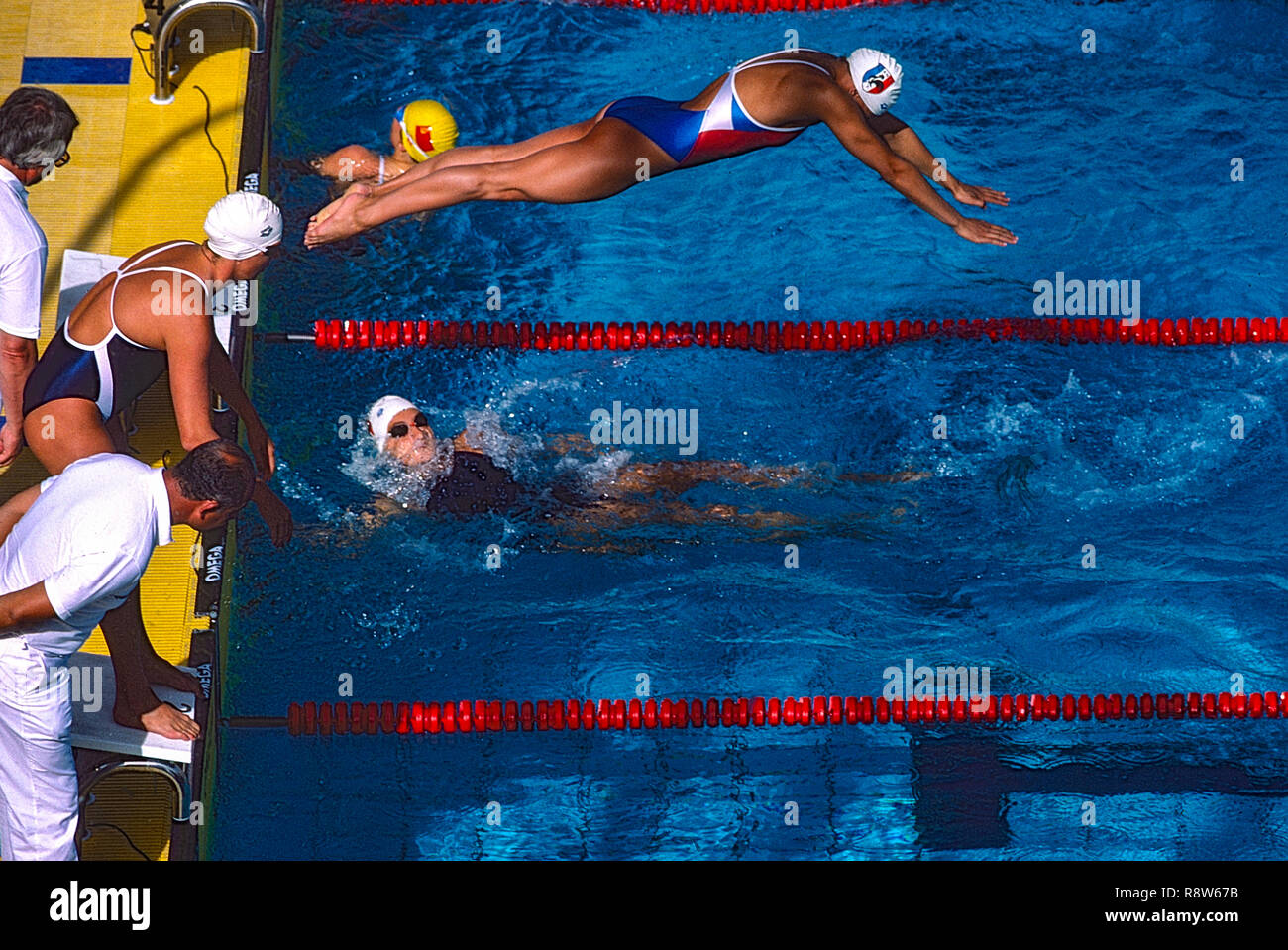 Swimmers at start of race Stock Photo - Alamy