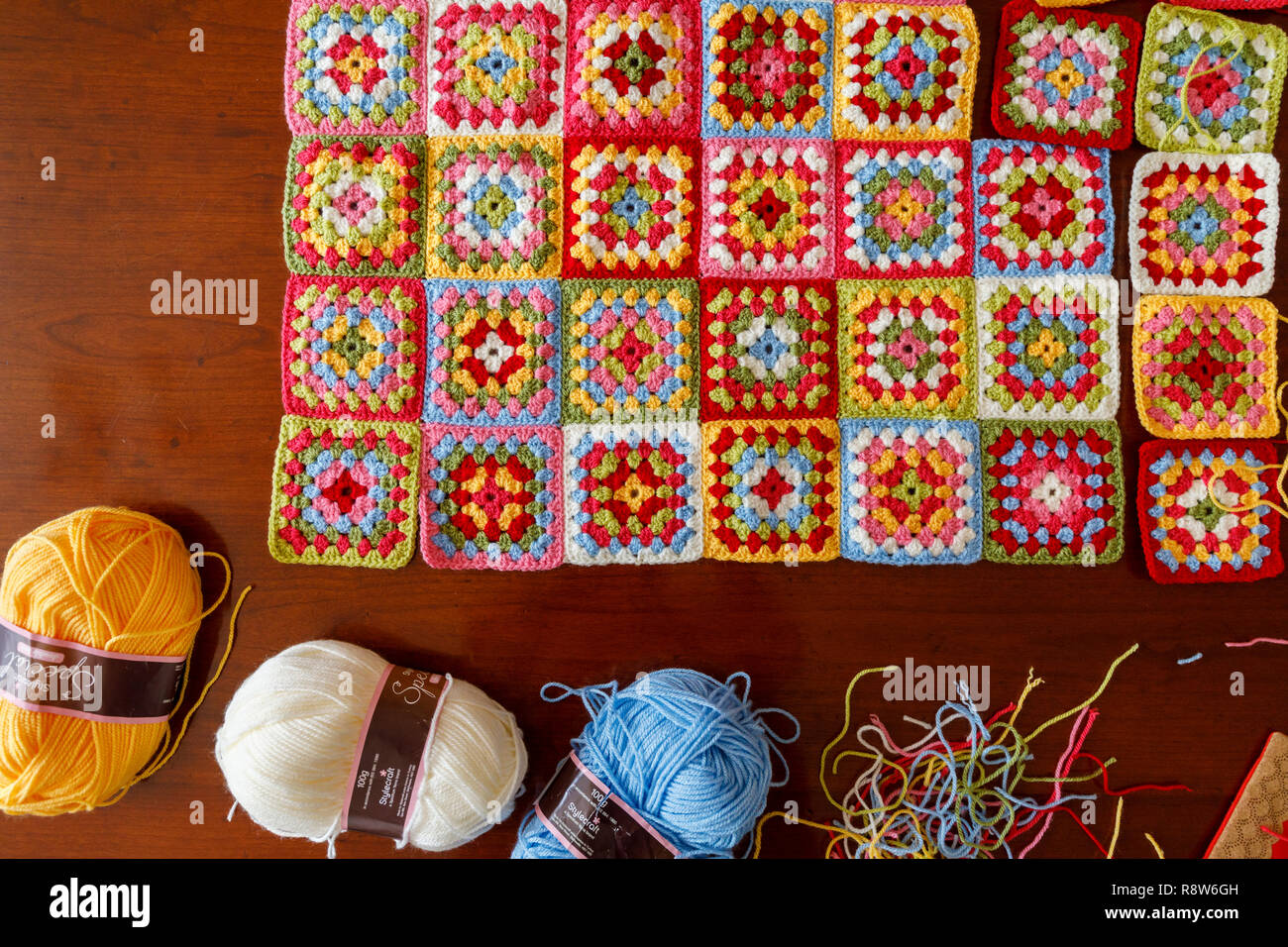 Brightly Coloured Granny Square Woollen Baby Blanket Traditional Hand Made Crochet Home Handicraft Stock Photo Alamy Brightly Coloured Granny Square Woollen Baby Blanket Traditional Hand Made Crochet Home Handicraft Stock Photo Alamy