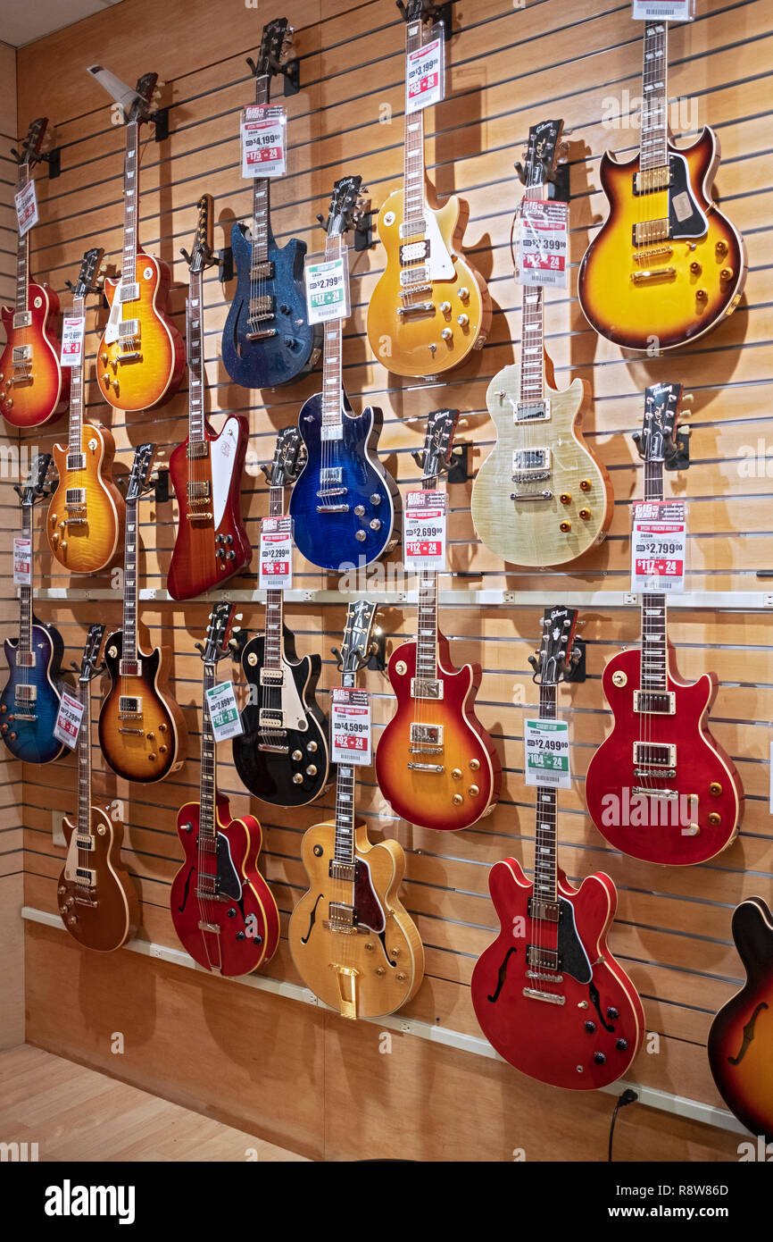 Expensive used vintage Gibson electric guitars for sale at Sam Ash, a  musical instrument company in Manhattan, New York City Stock Photo - Alamy