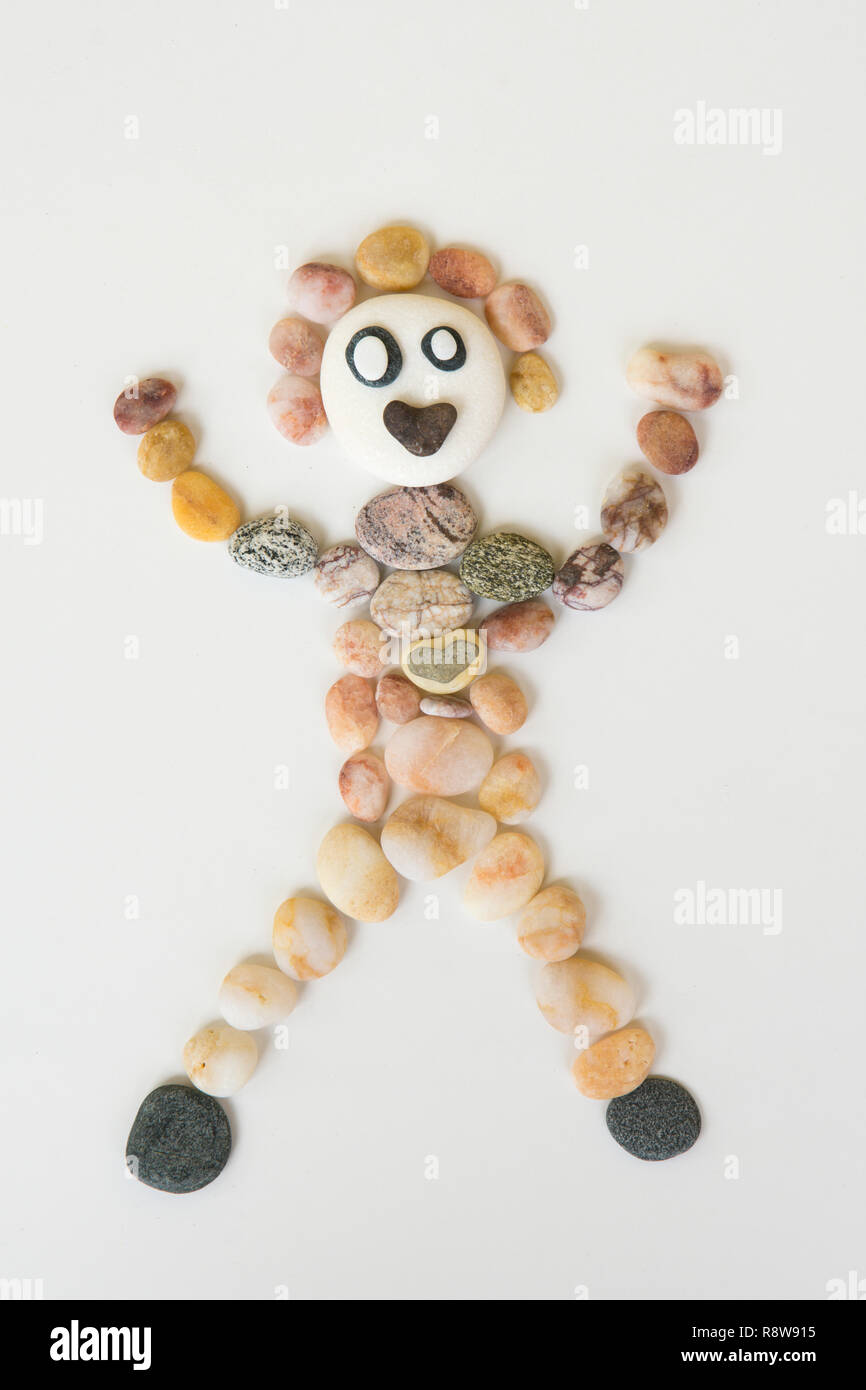 natural art, craft, picture of person, made from pebbles, shells, Stock Photo