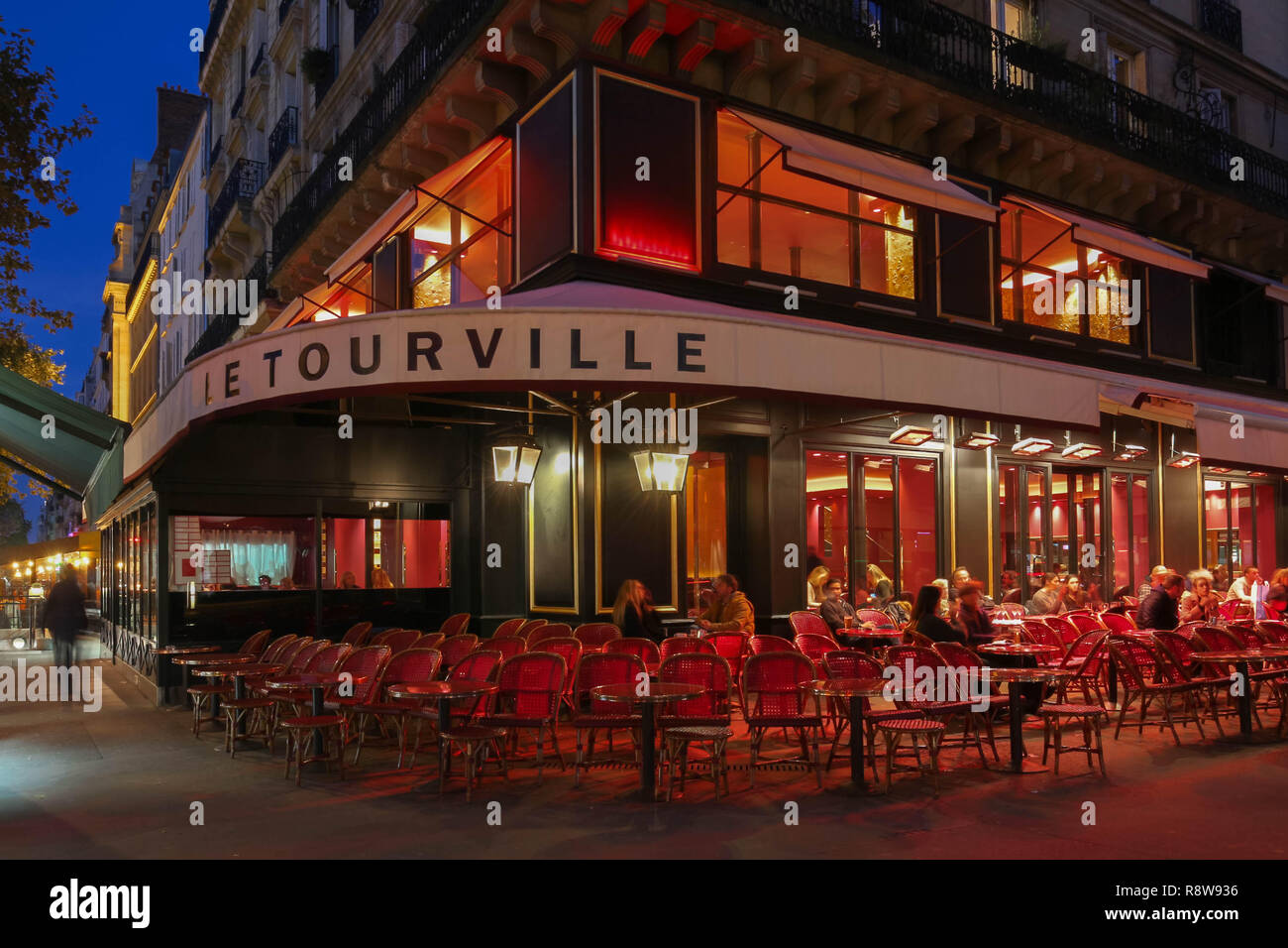 Le Tourville night view, a traditonal French cafe located near the ...