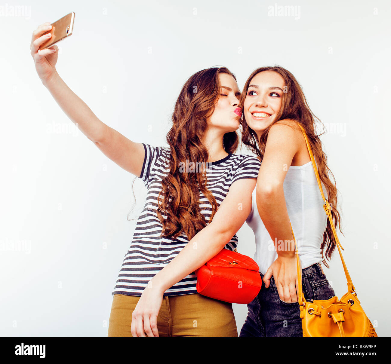 best friends teenage girls together having fun, posing emotional on white  background, besties happy smiling, lifestyle people concept close up.  making selfie Stock Photo - Alamy