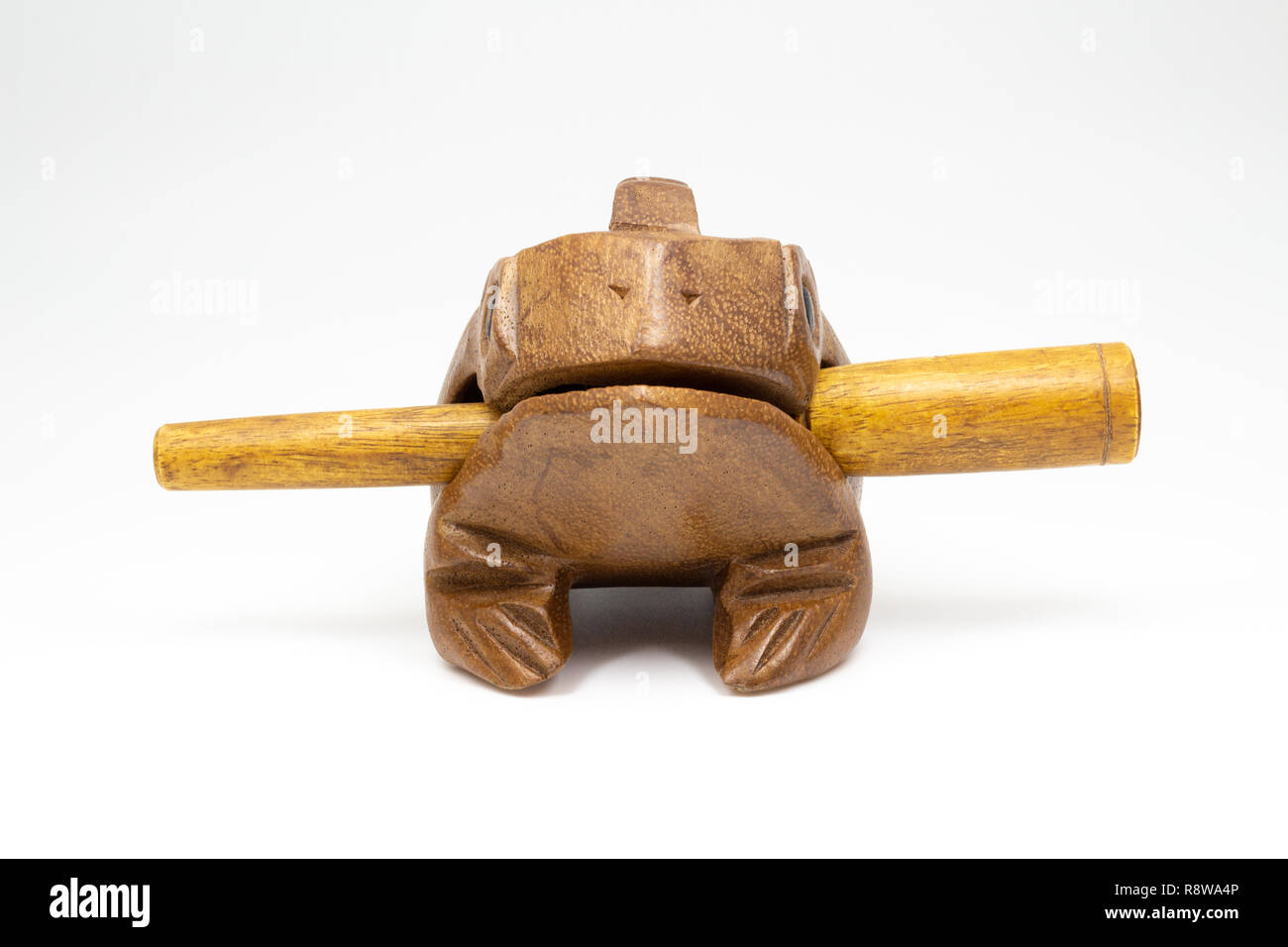 Wooden musical instrument wooden frog with a stick originated from