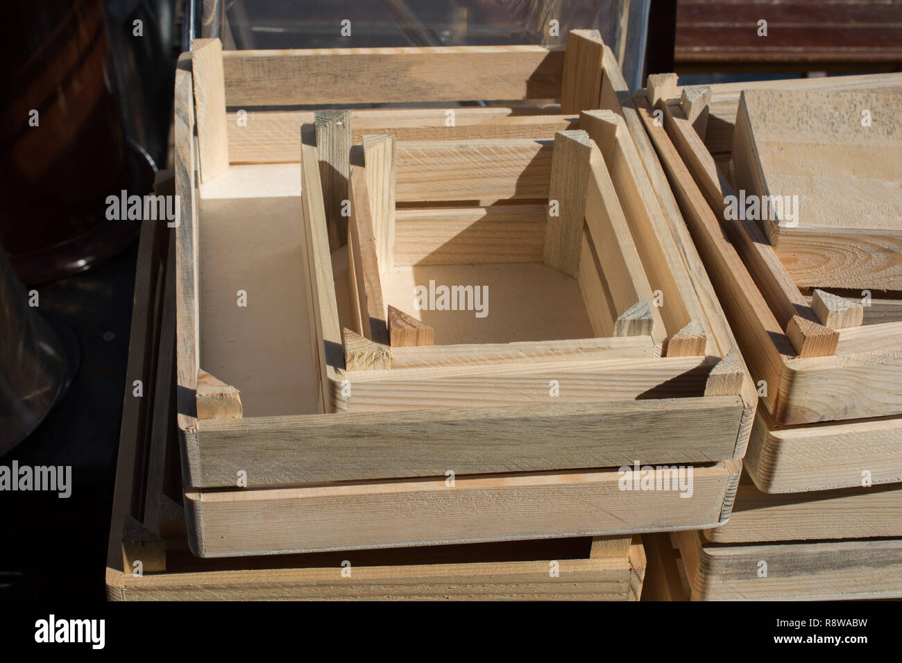Wooden empty crate box for sale in a market Stock Photo - Alamy