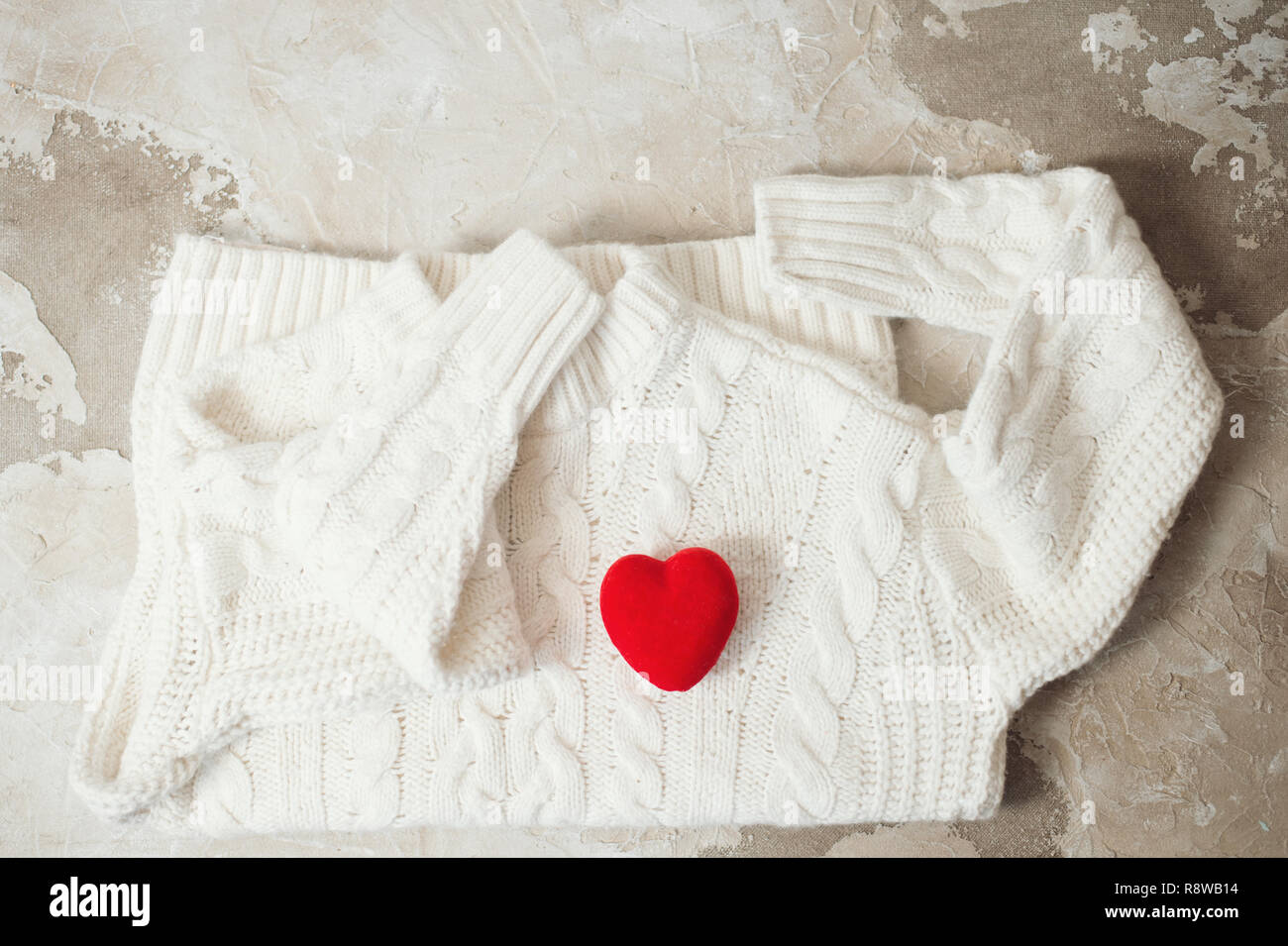 Top view woolen sweater red heart Stock Photo
