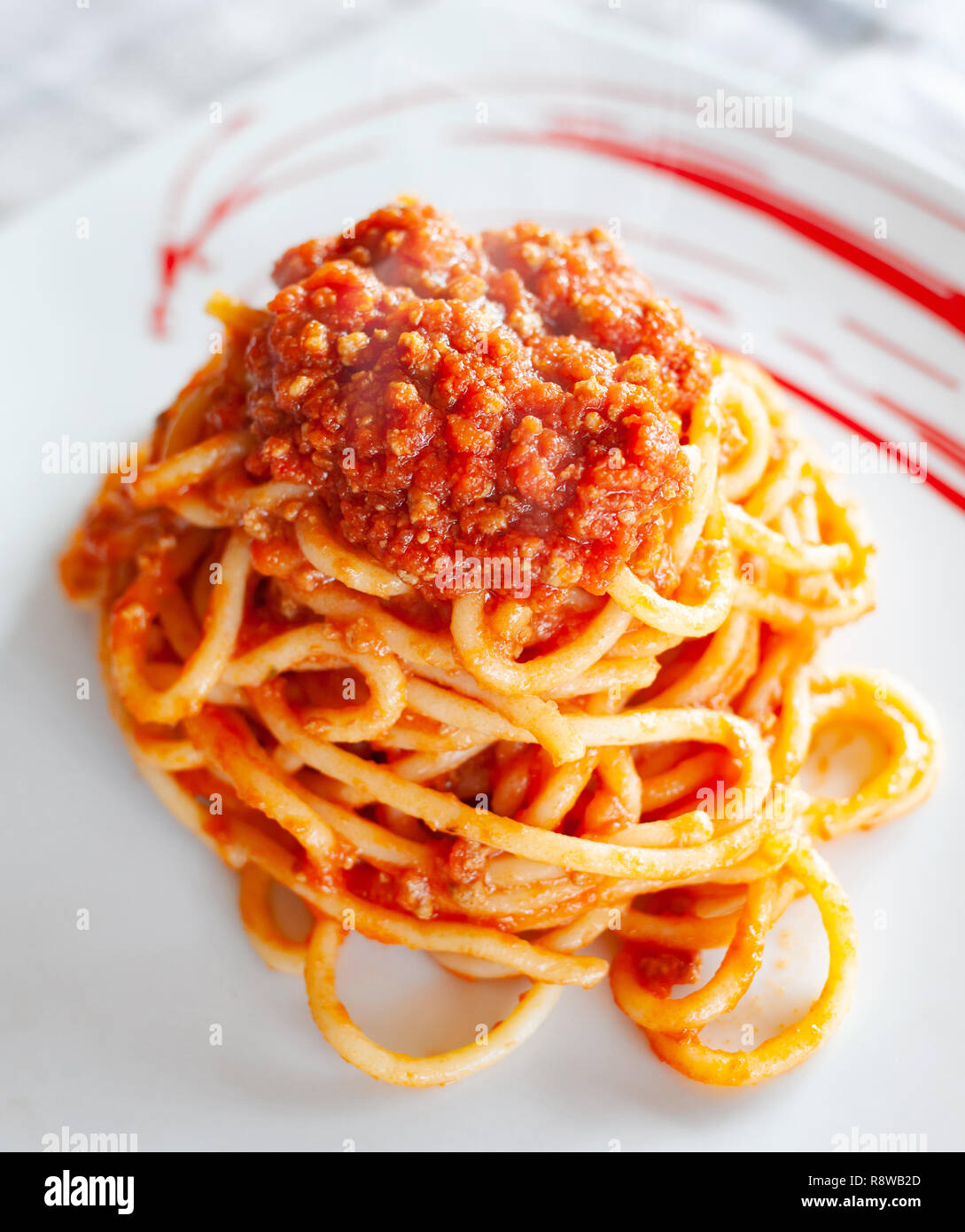 Traditional Tuscan dish, Pici pasta with wild boar meat Stock Photo Alamy