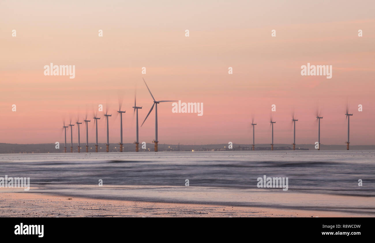 The wind farm at Redcar, Teesside, photographed at dusk. Stock Photo