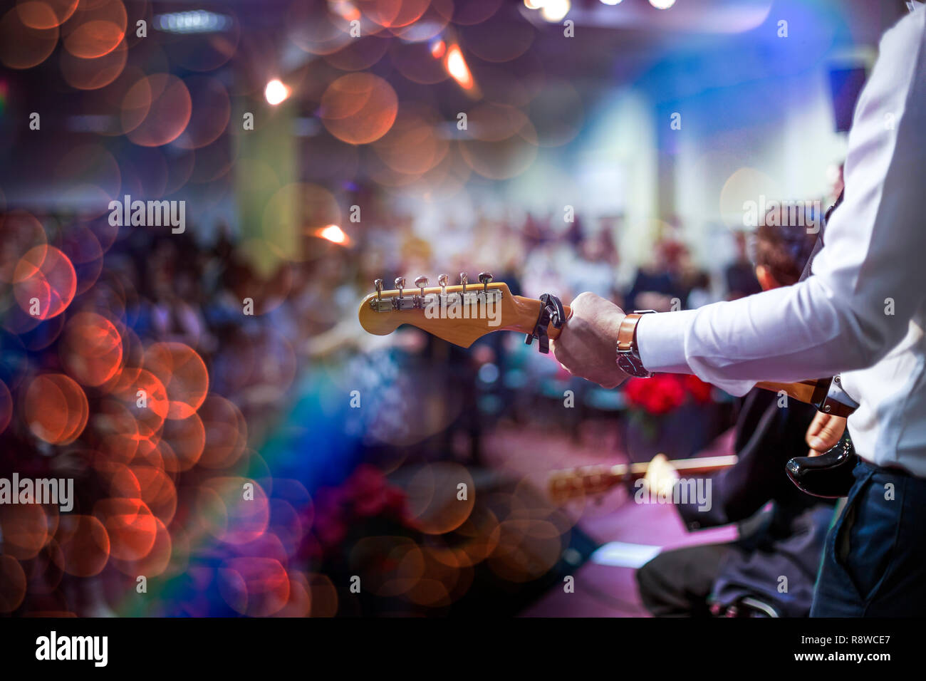 Artist playing an acoustic guitar on stage Stock Photo Alamy