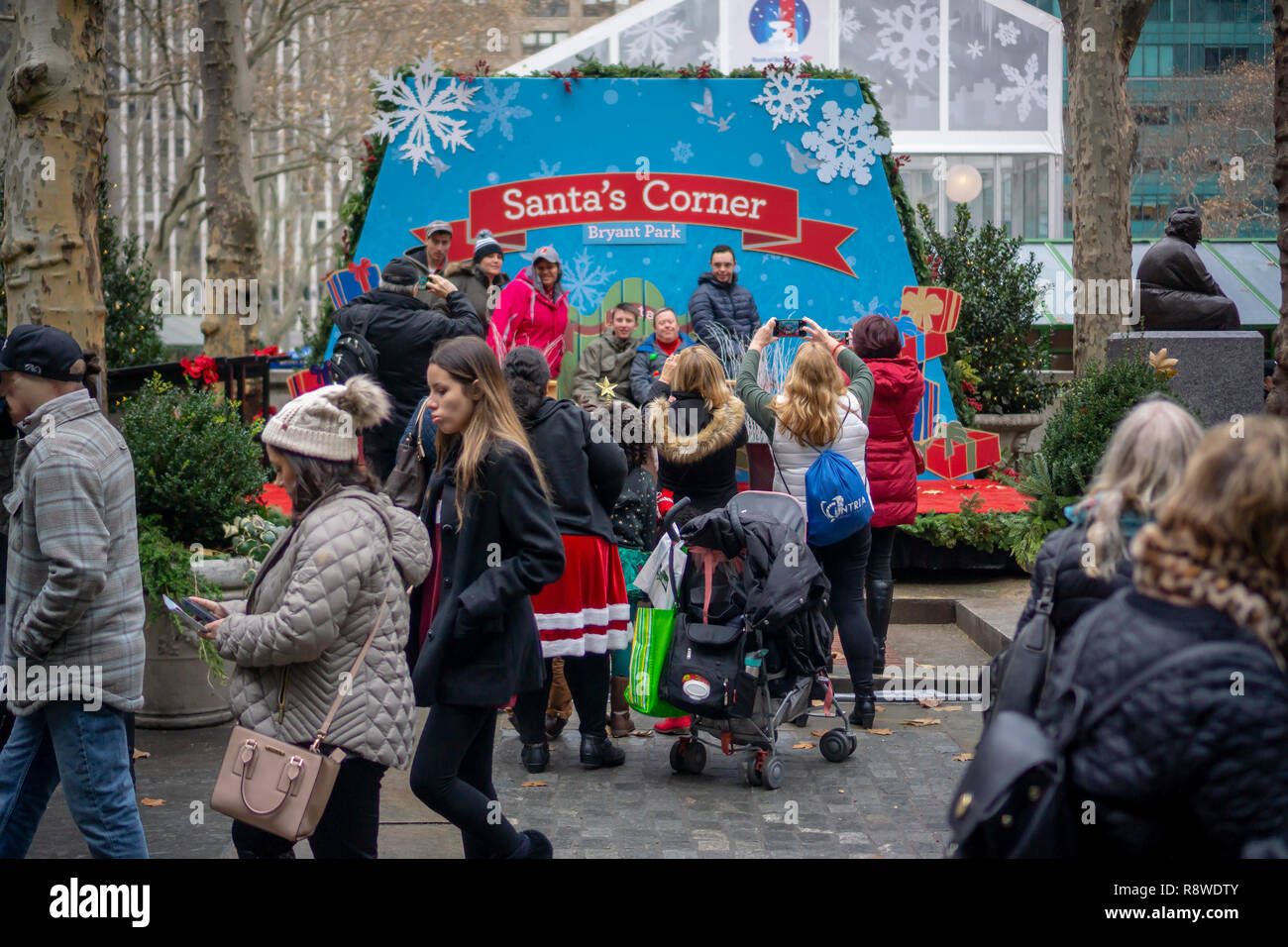 Visitors take advantage of Santa's Corner in Bryant Park in New York while Santa is away on urgent business, seen on Saturday, December 5, 2018. (Â© Richard B. Levine) Stock Photo