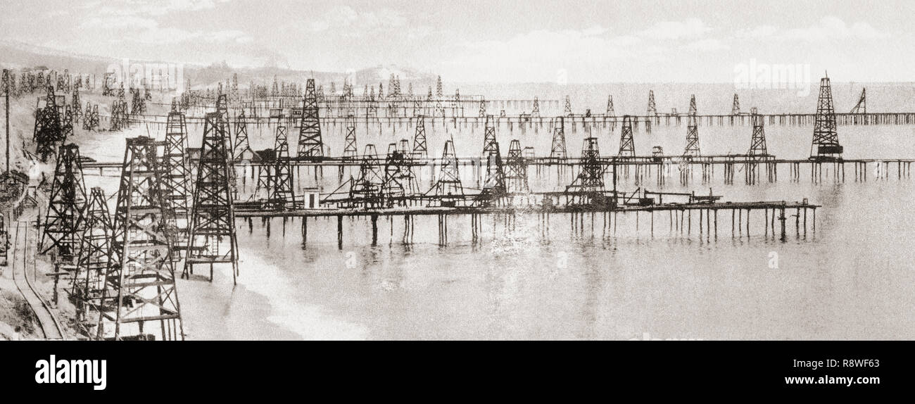 Oil wells drilled into the bed of the Pacific ocean at Summerland, between Santa Barbara and Los Angleles, California, United States of America, c. 1915.  The world's first offshore oil wells, drilled from piers in 1896.  From Wonderful California, published 1915. Stock Photo
