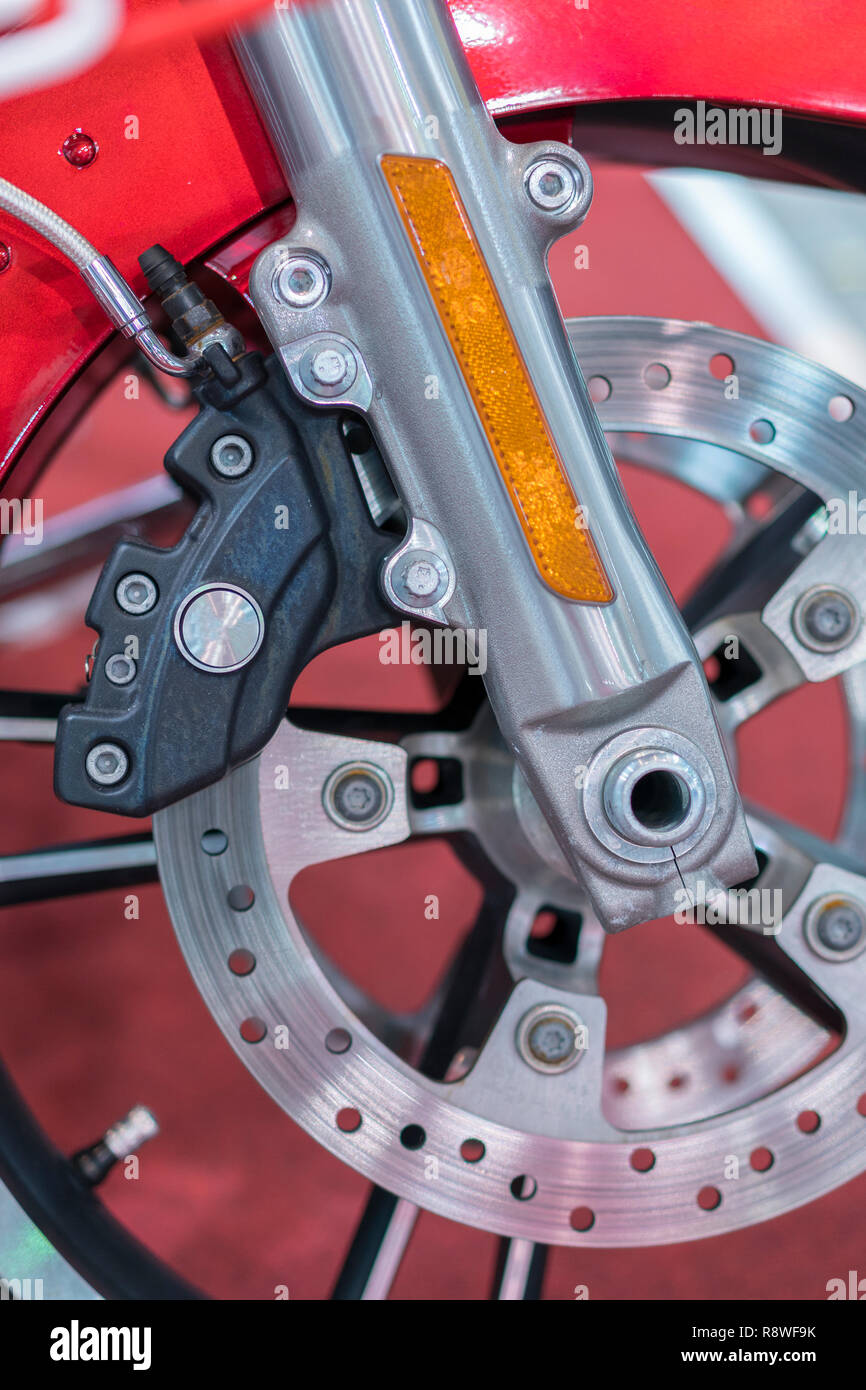 Brakes Close Up on a Motorcycle. Motorbike disk brake. vertical photo