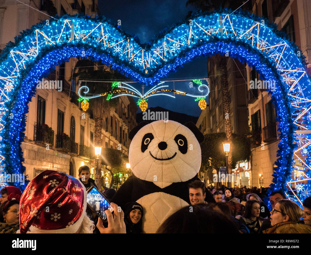 'Giant Panda' posig for photos at Christmas time in Salerno,Campania region, Italy Stock Photo