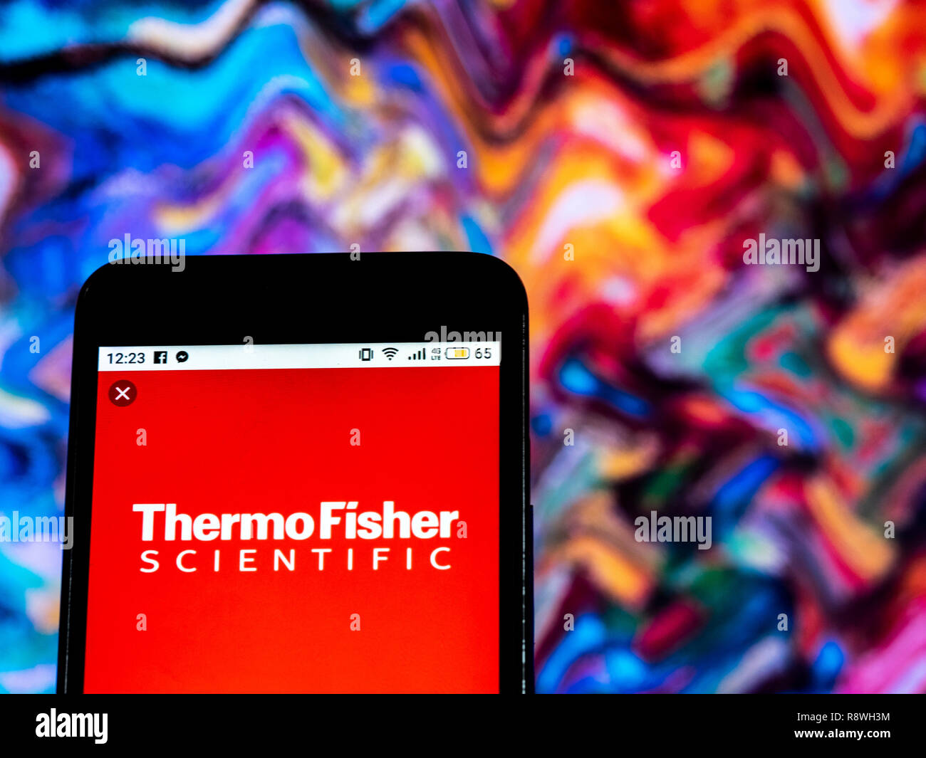Thermo Fisher Scientific Company logo seen displayed on smart phone Stock Photo
