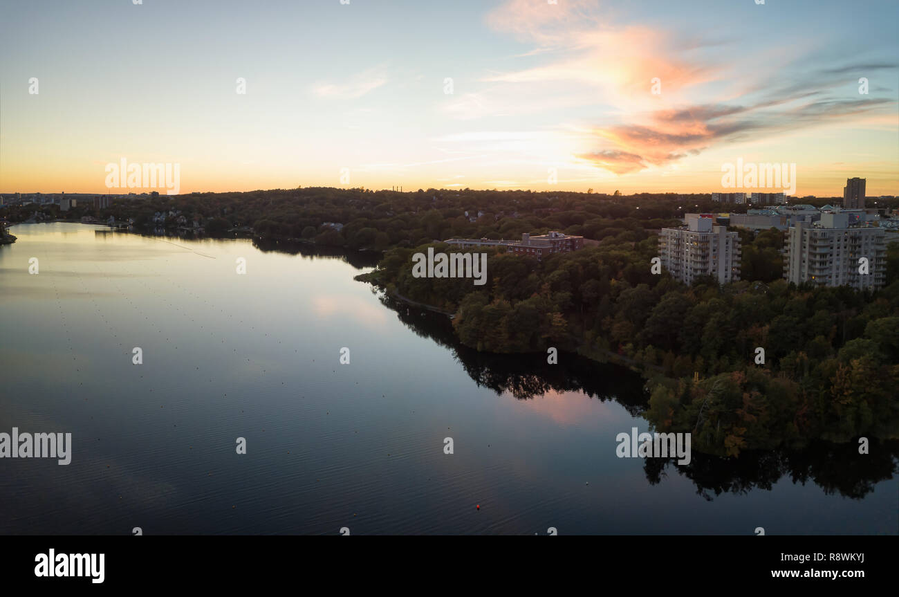 Aerial panoramic view of a Lake Banook in the Modern City during a