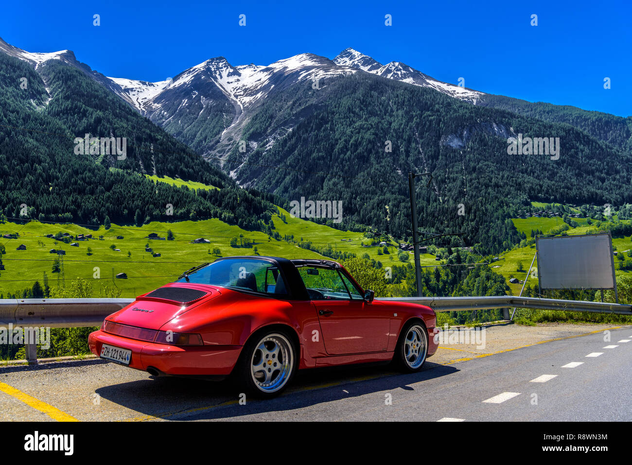 FILET, SWITZERLAND - APR 2017: Red Porsche 911 993 cabrio in Swiss Alps,  Moerel, Filet, Oestlich Raron, Wallis Valais Switzerland Stock Photo - Alamy