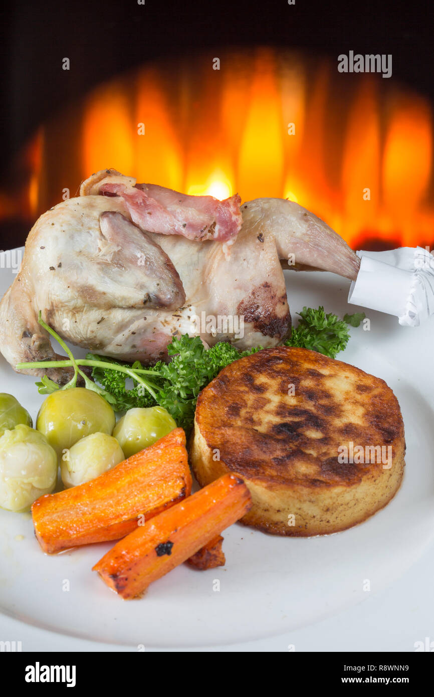 Whole Quail wrapped in Bacon and oven roasted, served with Fondant