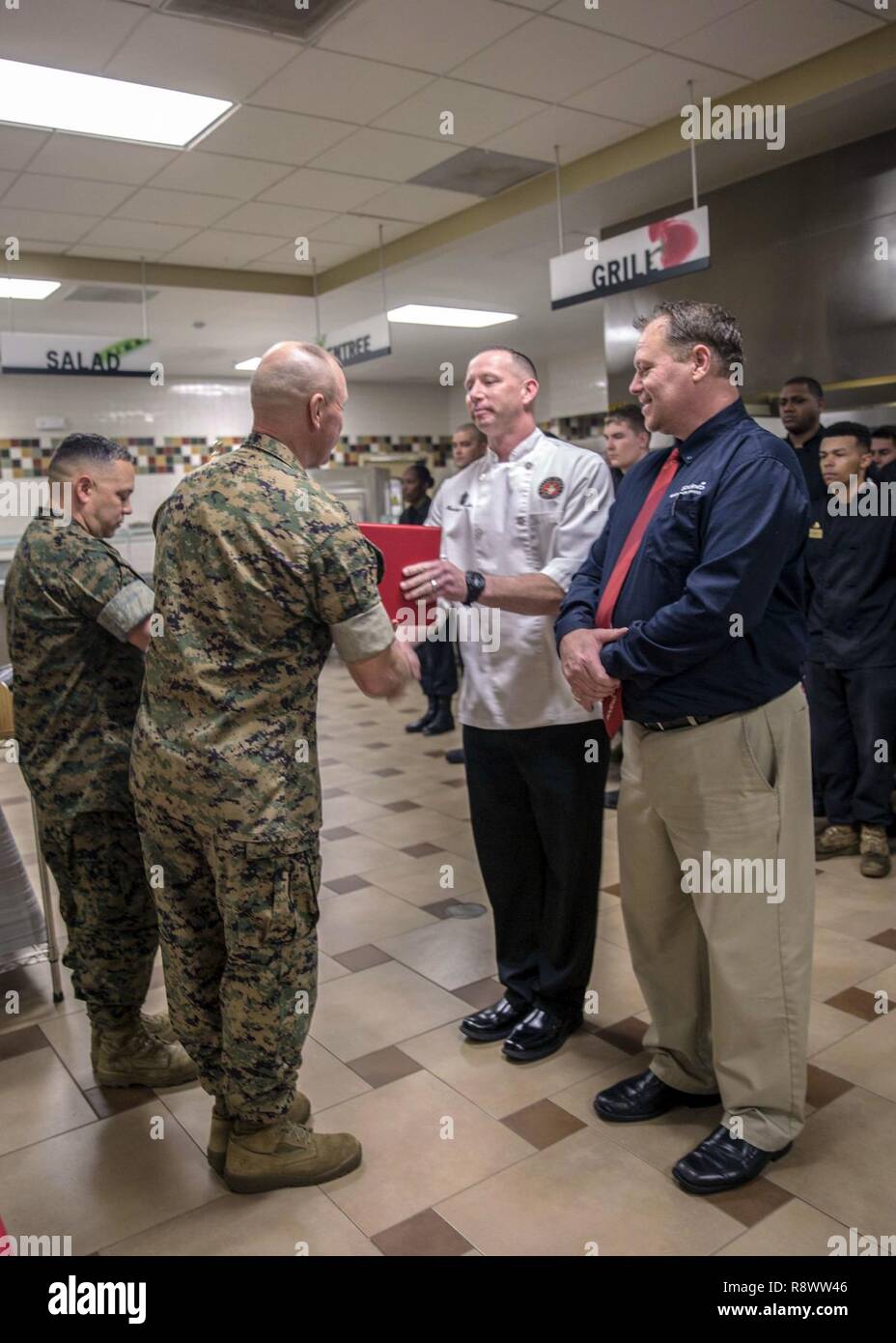 U.S. Marine Corps Col. Scott A. Baldwin, left, assistant chief of staff ...
