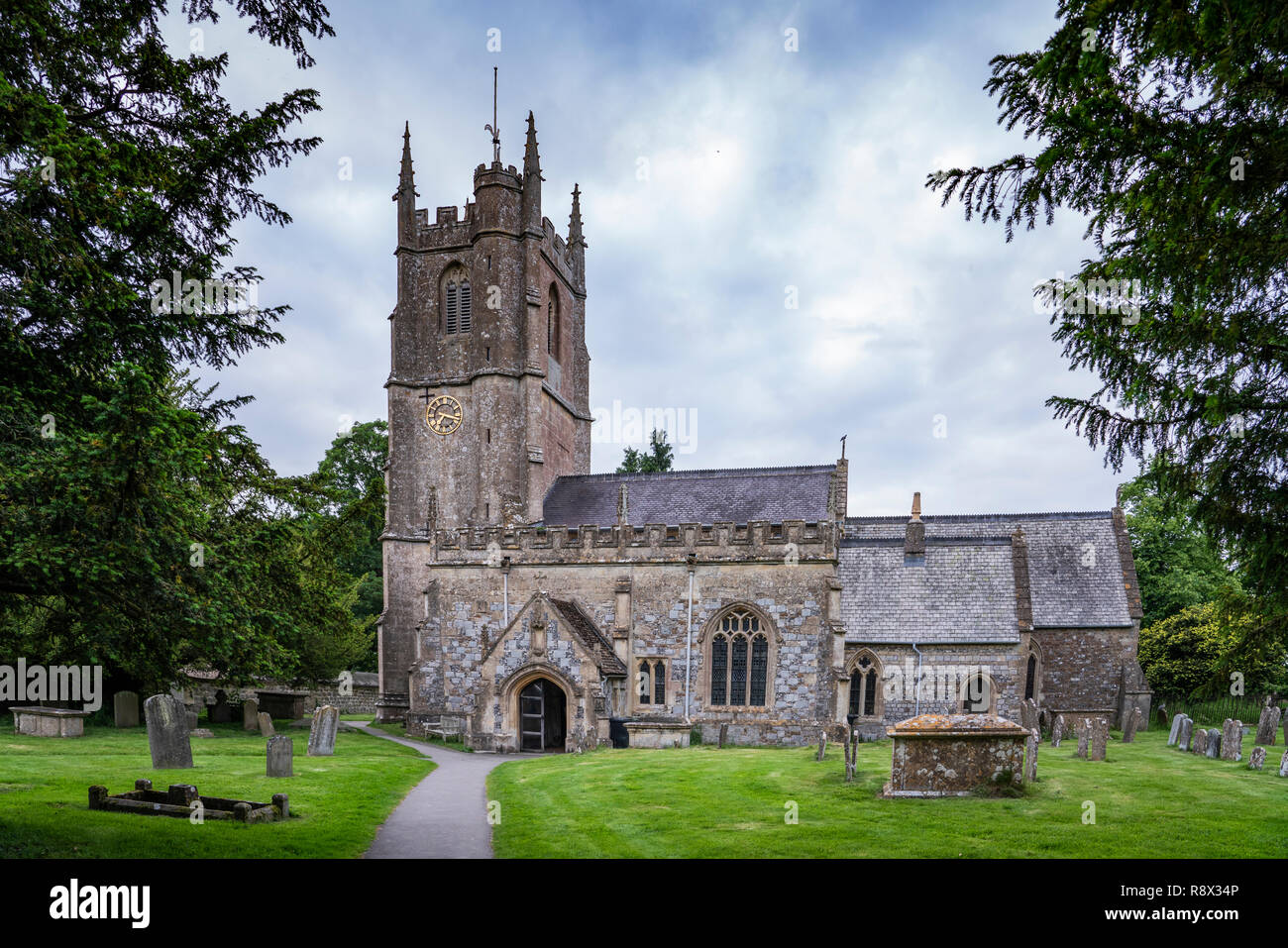 Ther historic St. James' Anglican Church in the village of Avebury, Wiltshire, England, Europe. Stock Photo