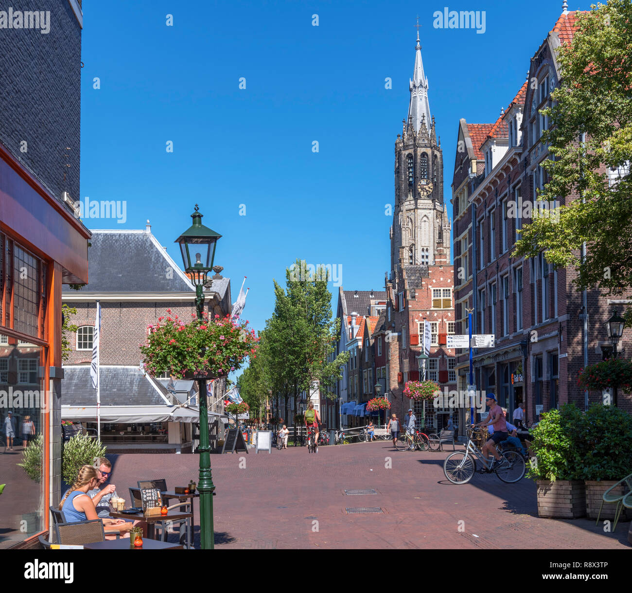 Delft Old Town looking towards  spire of historic 15th century Nieuwe Kerk (New Church), Nieuwstraat, Delft, Zuid-Holland (South Holland), Netherlands Stock Photo