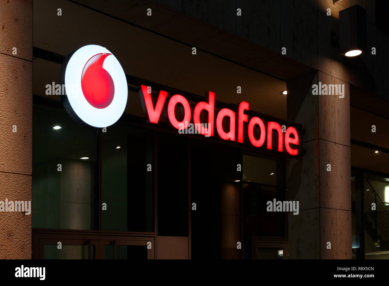 Karlsruhe, Germany - Sept 2018: Vodafone mobile operator neon sign Stock Photo