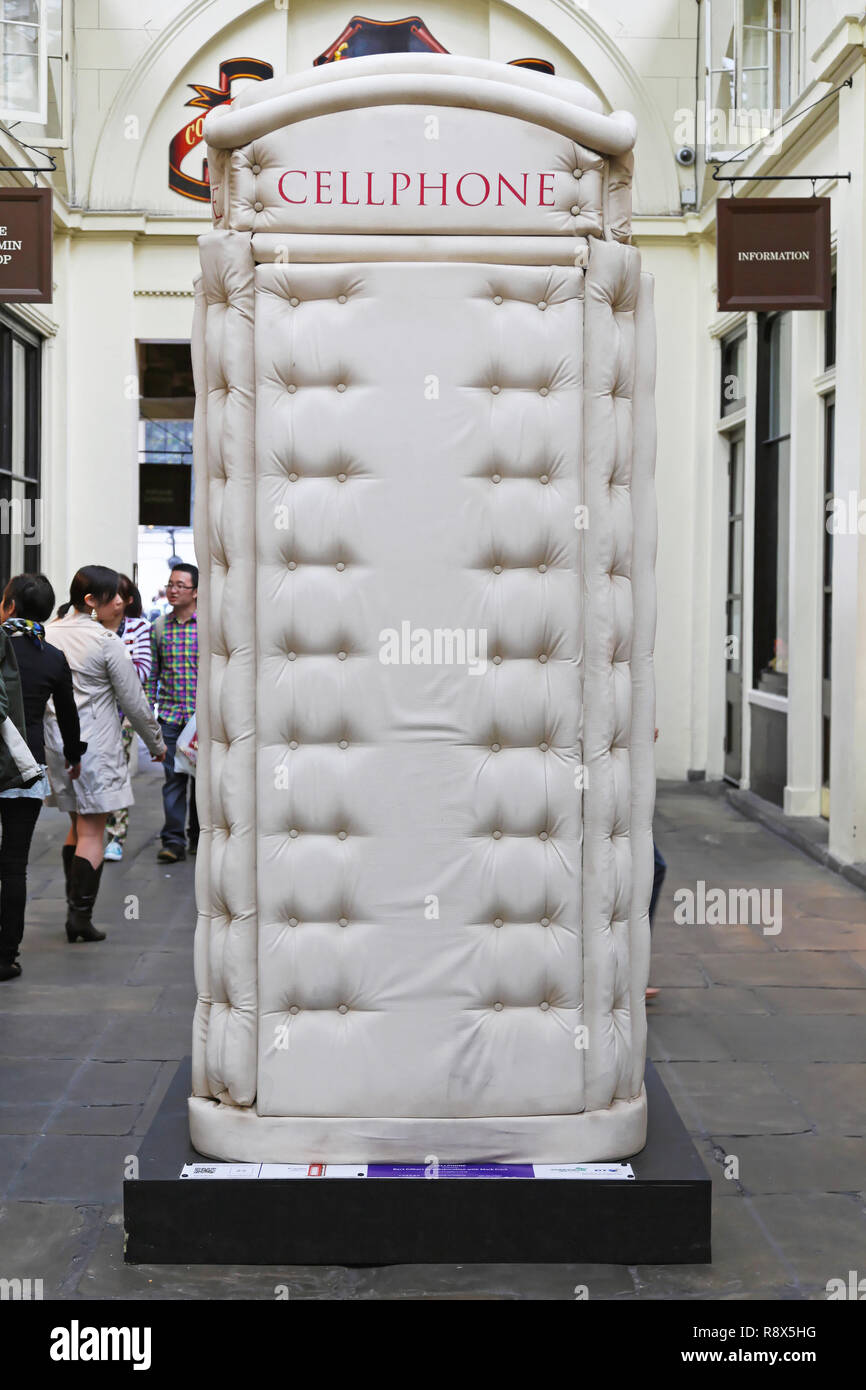 LONDON, UNITED KINGDOM - JUNE 23: Telephone booth in London on JUNE 23, 2012. Padded Cell Phone Box from Bert Gilbert at Covent Garden in London,  Uni Stock Photo