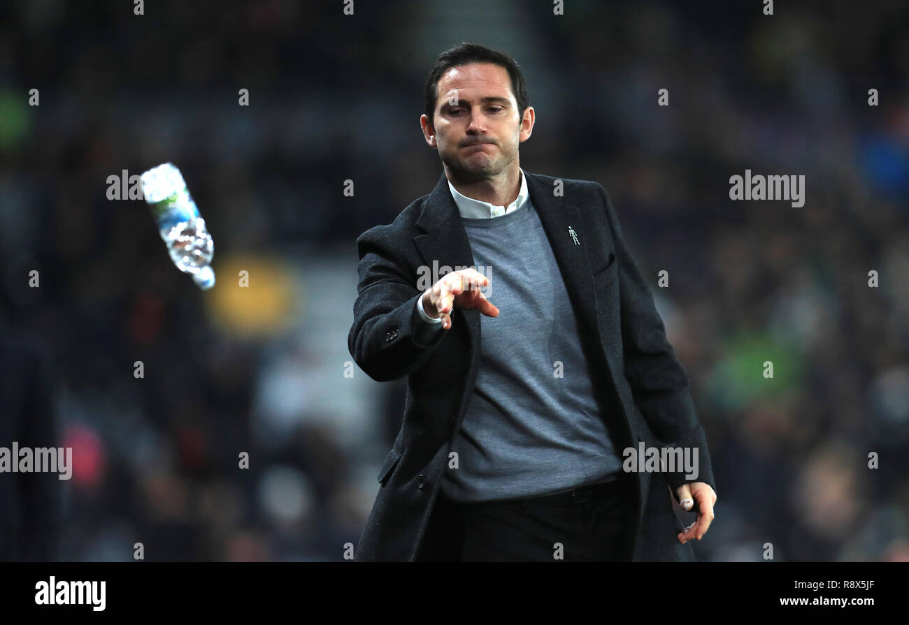 Derby County manager Frank Lampard throws a bottle of water during the Sky Bet Championship match at Pride Park, Derby. Stock Photo