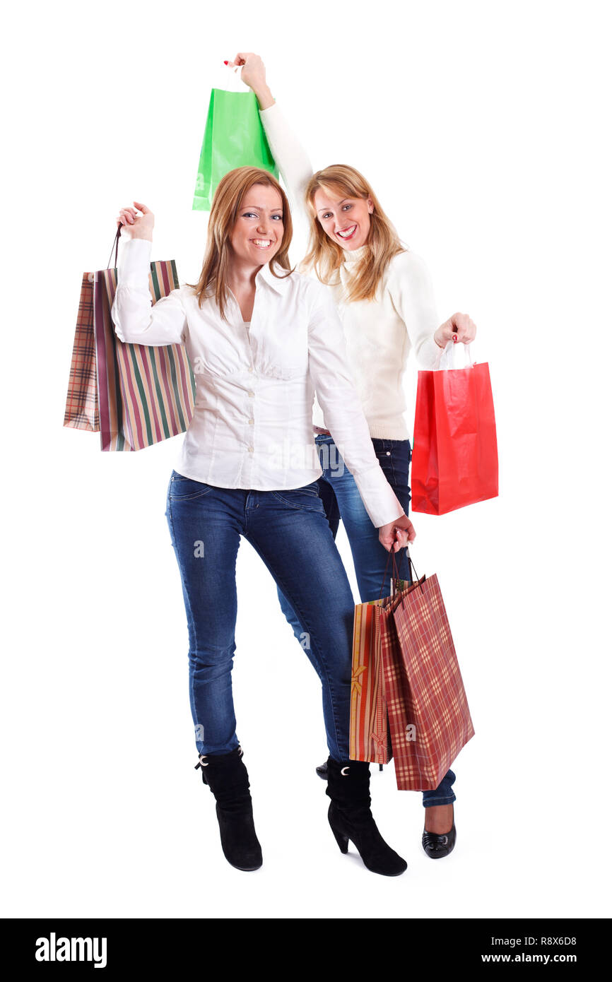 Two beautiful young women with shopping bags Stock Photo - Alamy