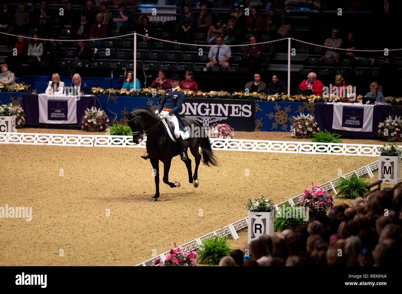 Netherlands' Hans Peter Minderhound riding Glock's Dream Boy N.O.P competes in the FEI Dressage World Cup Grand Prix during day one of the London International Horse Show at London Olympia. Stock Photo