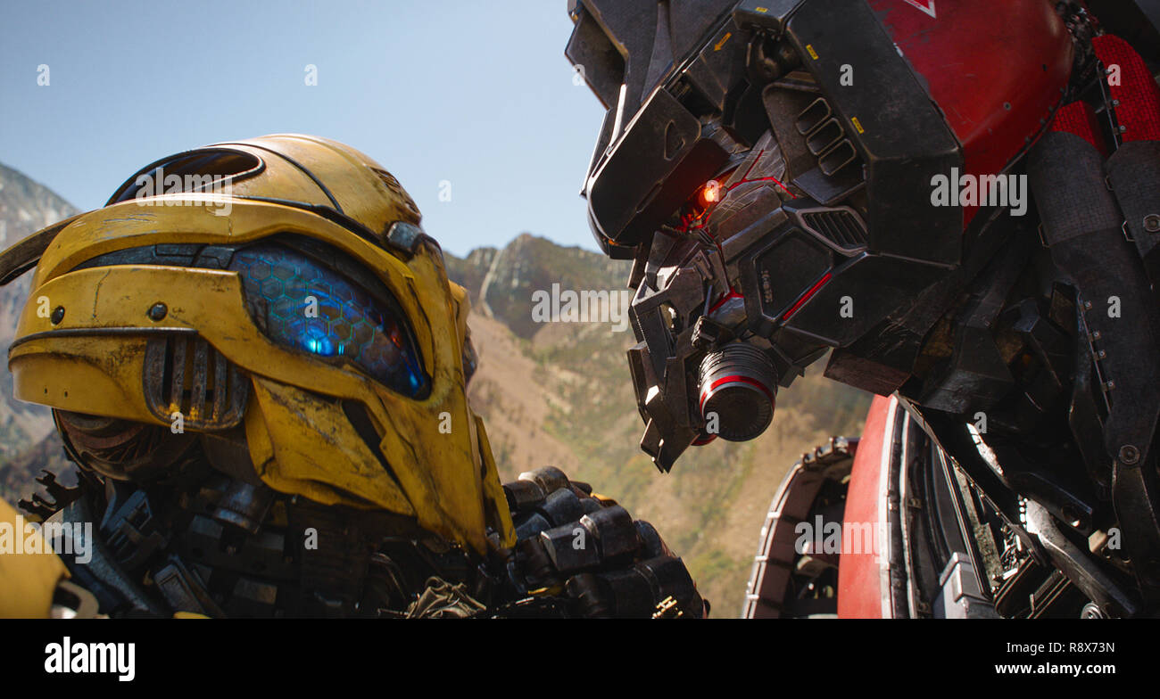 BUMBLEBEE, from left Bumblebee (voice Dylan O'Brien), Blitzwing
