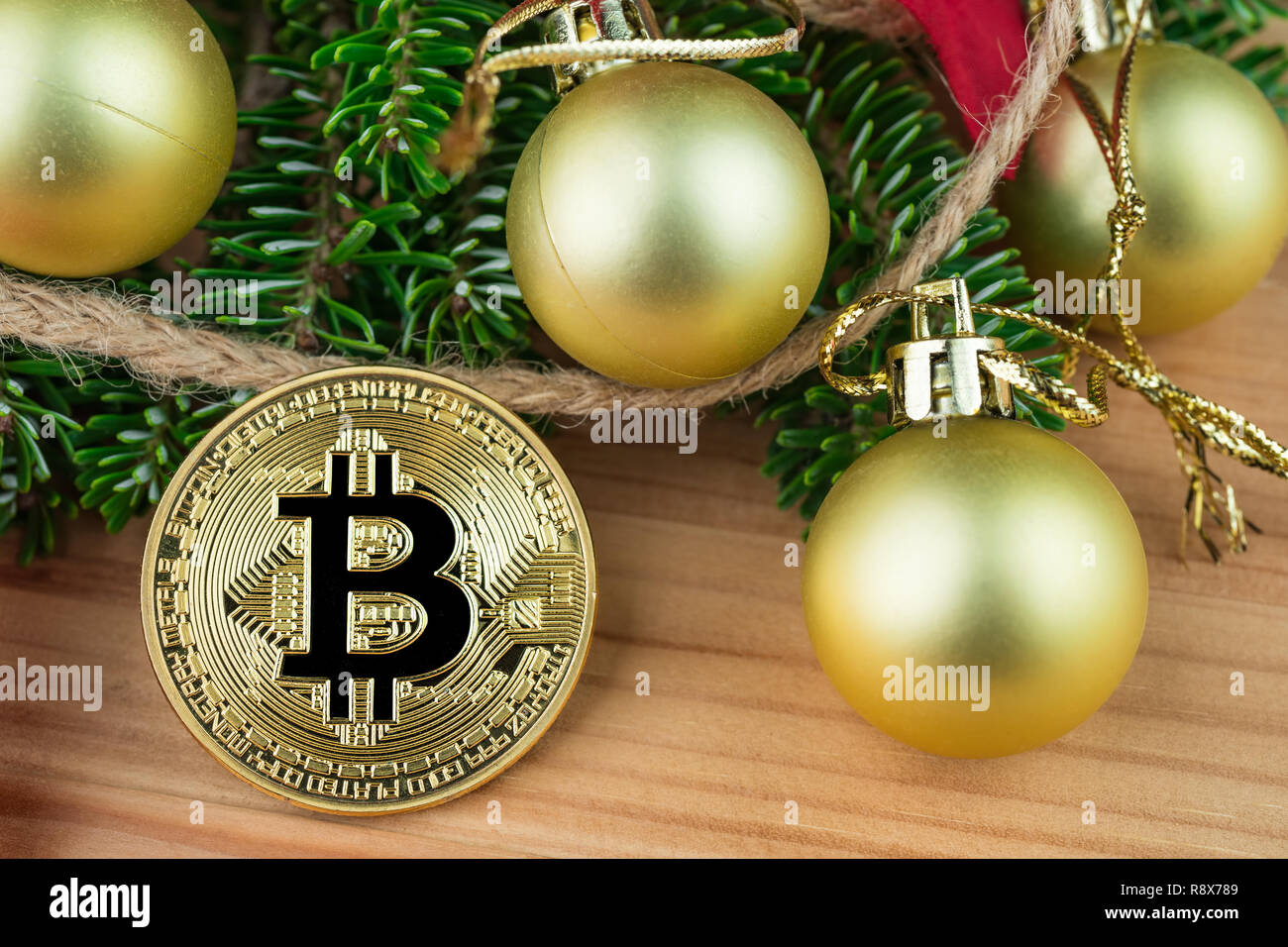 Christmas Decoration Golden Baubles Poinsettia Fir Branches With Bitcoin Litecoin And Ethereum Physical Coins On Natural Wooden Background Crypt Stock Photo Alamy