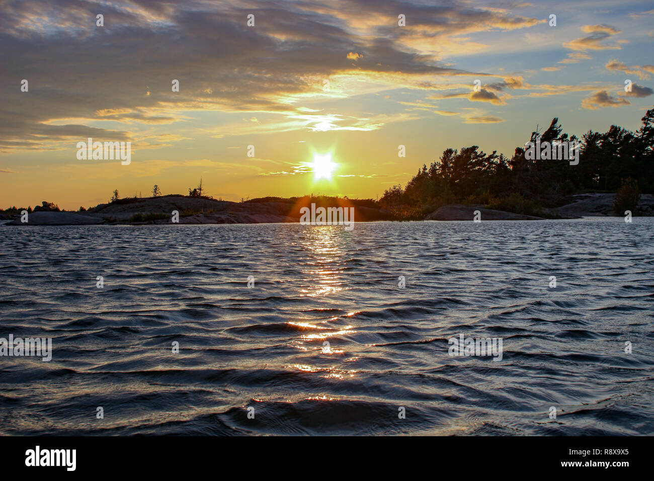 sunset on lake in georgian bay of ontario canada Stock Photo