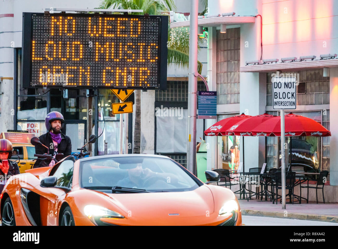 Miami Beach Florida,Collins Avenue,electronic LED sign,no weed marijuana loud music open containers,FL181205134 Stock Photo