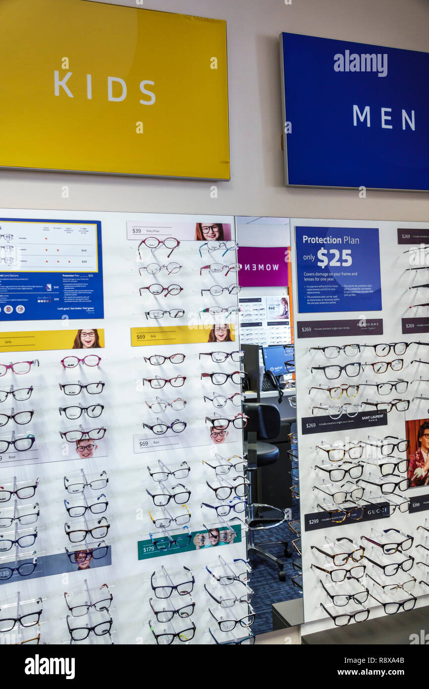 Miami Beach Florida,optician optometrist business store,eyeglasses display sale,kids,men,FL181205143 Stock Photo