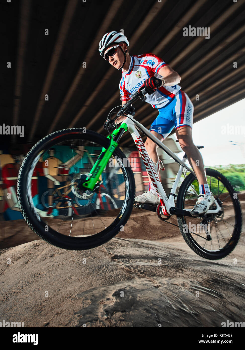 Moscow, Russia - August 10, 2017: Mountain Bike cyclist riding pump track.  Rider in action at mountain bike sport. Cool athlete cyclist on a bike. MTB  Stock Photo - Alamy