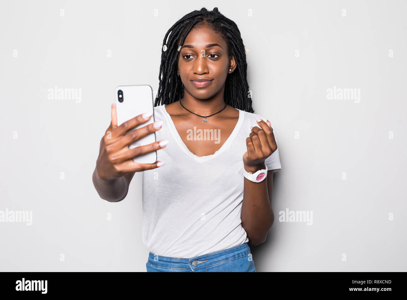 Young African American woman taking a selfie - self portrait - Black  teenager people Stock Photo - Alamy, image size:1300x956