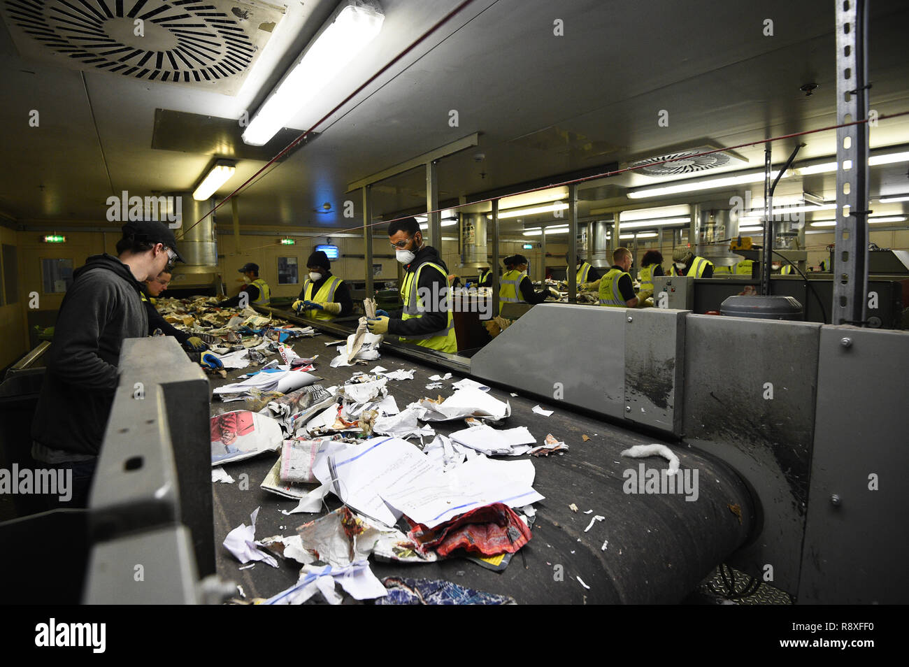 Workers sort recycling at the Veolia Integrated Waste Management
