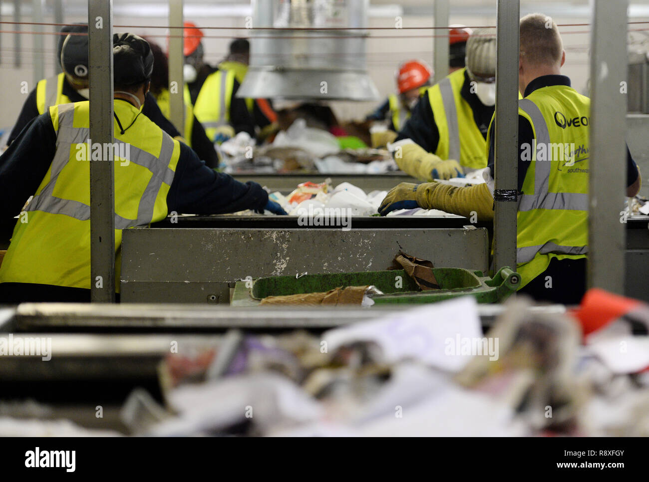 Workers sort recycling at the Veolia Integrated Waste Management