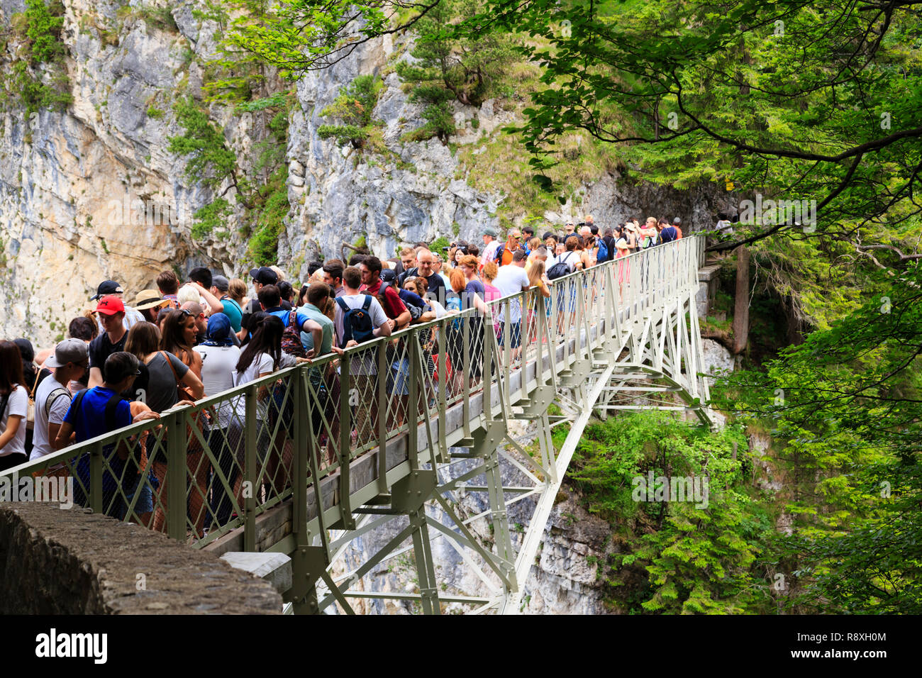 Crowds of tourists on the Marienbruke viewing area for Schloss Neuschwanstein,  Bavaria, Germany Stock Photo